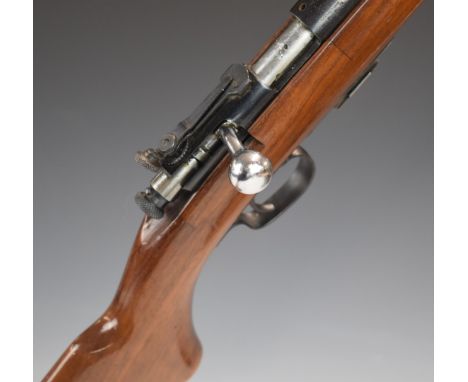 Winchester .22 bolt-action rifle with semi-pistol grip, adjustable sights, magazine and 25 inch barrel, overall length 106cm,
