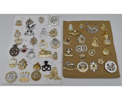 Collection of approximately forty Staybrite badges including Highland Light Infantry, Queen's Own Hussars, 9th/12th Lancers, 