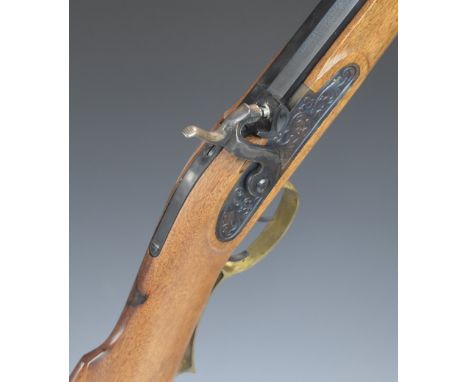 Italian .45 percussion hammer action Kentucky style rifle with brass trigger guard, storage compartment to the stock, butt pl