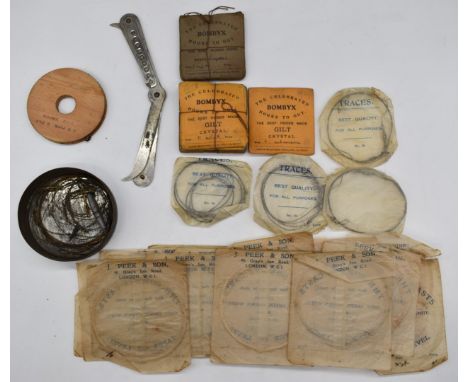 A group of vintage fishing hooks, traces and casts, most by Bombyx and J Peek &amp; Son