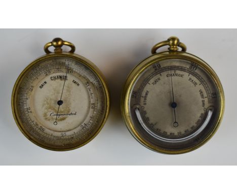 Two pocket barometers, one with curved thermometer