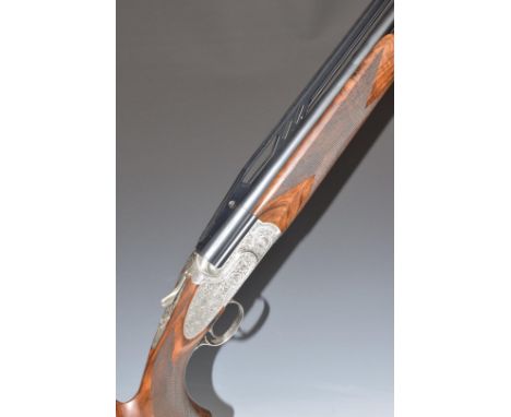 Caesar Guerini 12 bore over and under sidelock ejector shotgun with finely engraved locks, underside, trigger guard, top plat