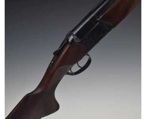 Baikal NK-27E 12 bore over and under ejector shotgun with engraved scenes of birds to the locks, engraved top lever, trigger 
