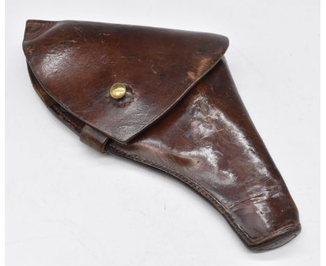 British brown leather pistol or revolver holster with brass fittings and 'CG' stamped either side of a ministry broad arrow, 