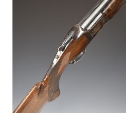 Miroku 12 bore over and under ejector shotgun with engraved lock, chequered semi-pistol grip and forend, single trigger, vent