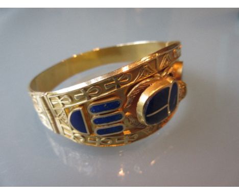 Egyptian yellow metal and lapis lazuli set bangle in a fitted box