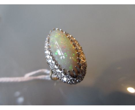 Large 18ct gold opal and diamond set oval cluster ring