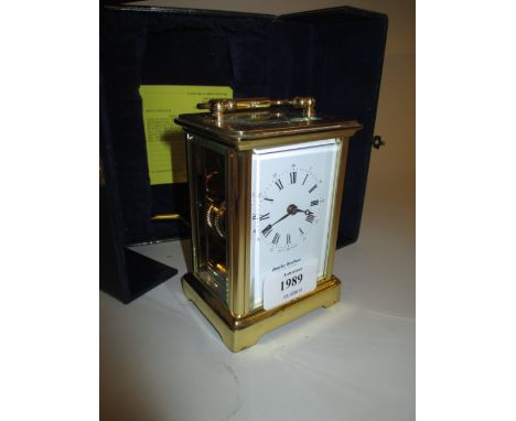 20th Century brass cased carriage clock, the enamel dial with Roman numerals and inscribed Bentley Brothers, City of London, 