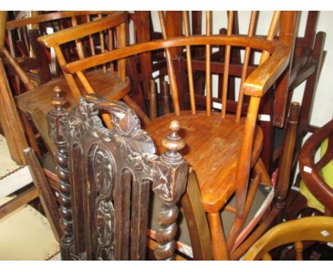 Pair of 20th Century Windsor type stick back elbow chairs