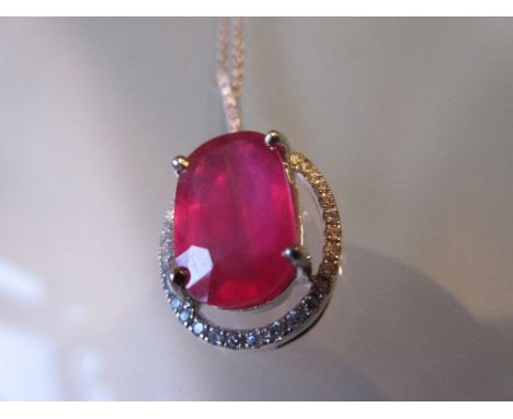 18ct White gold treated ruby and diamond pendant necklace on an 18ct white gold chain, the ruby approximately 6.3ct