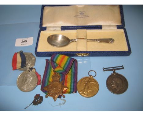 World War I medal group of three awarded to Pte. R. Edom, A.O.C. No. 06303 together with two medallions, a silver badge and a