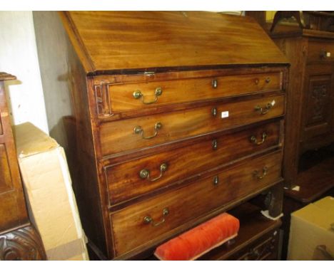 George III mahogany bureau, the fall front above four graduated drawers with brass swan neck handles and bracket feet