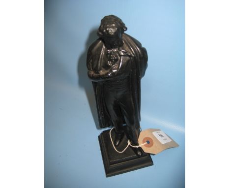 20th Century Russian cast iron figure of a gentleman in a cloak