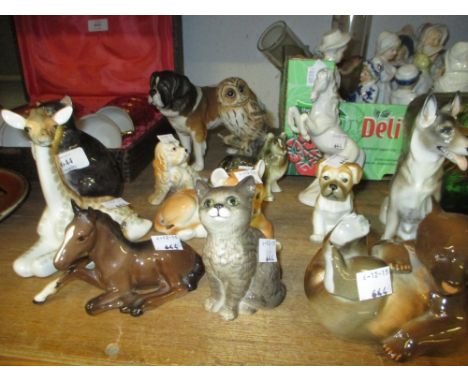 Beswick figure of a cat, another Beswick figure of a St. Bernard dog, Royal Doulton figure of a cat together with a quantity 