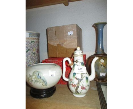 Miniature Chinese porcelain teapot decorated with exotic birds and flowers in a fitted box together with a small bowl on a ha