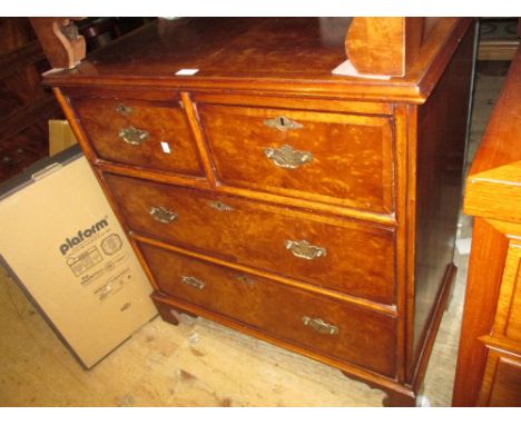 20th Century walnut chest of two short over two long drawers, raised on shaped bracket feet