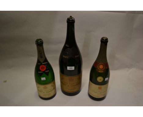 1941 Moet and Chandon Jeroboam bottle drilled for a table lamp, together with two other Champagne bottles, all empty