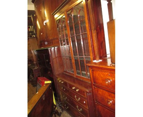 19th Century mahogany and chequer line inlaid bookcase, the moulded key pattern cornice above a pair of Gothic arched bar gla