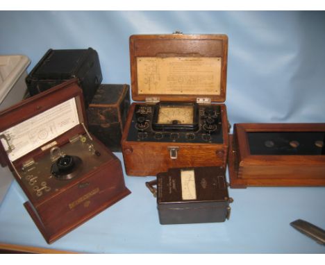 Cased box camera, a Gecophone crystal radio, a servant bell call board and two cased metres