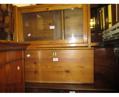 Small stripped polished pine wall cabinet, small ebonised wall cabinet, small pine trunk and a wall clock