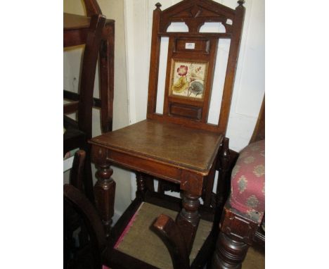 Victorian oak hall chair with tile inset back together with a vintage cabin trunk