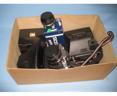 Olympus OM10 35mm camera with telephoto and wide angle lenses etc together with a Kodak polaroid camera