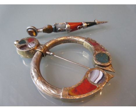 Scottish silver and agate cloak pin and a similar brooch