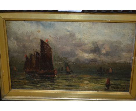 Late 19th Century British school, oil on board, seascape with a fishing fleet under a heavy sky, indistinctly signed and date