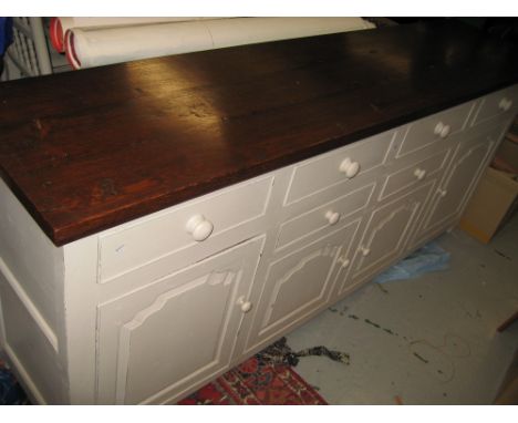 Good quality reproduction oak dresser base, the polished top above a painted base within an arrangement of six drawers and fo