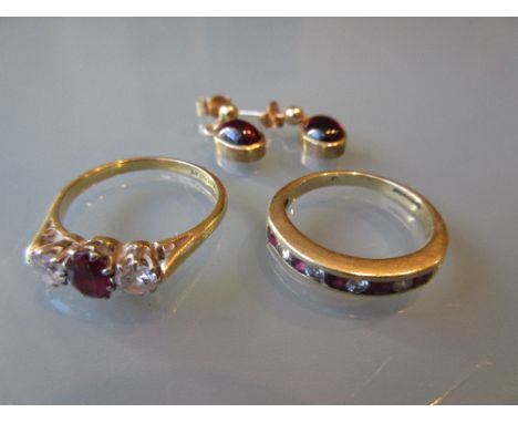 18ct Yellow gold ruby and diamond set ring, an 18ct yellow gold ruby and diamond set half eternity ring and a pair of gold ca