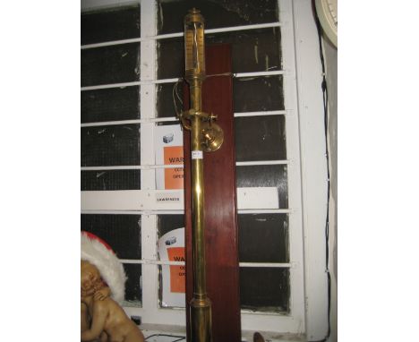 Brass cased marine stick barometer, the silvered dial with single adjustable vernier, signed J.J.B.L.M. Lisbon, mounted on a 