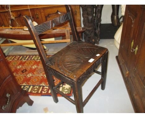 19th Century carved oak childs chair with panel seat on tapering supports with turned stretchers