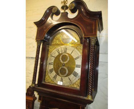 19th Century mahogany longcase clock, the broken arch hood with swan neck pediment above an arched panel door flanked by spir