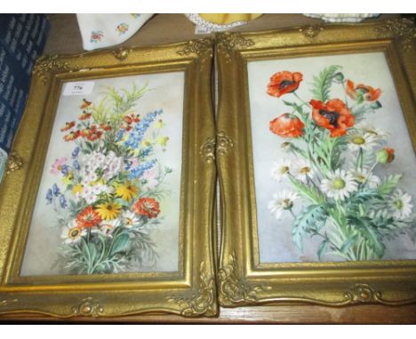 Pair of K.P.M. floral painted on porcelain wall plaques, signed R. Schubert, housed in gilt frames, 9ins x 6ins