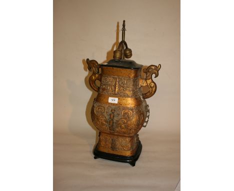 Large Chinese gold patinated metal table lamp with dragon motif handles