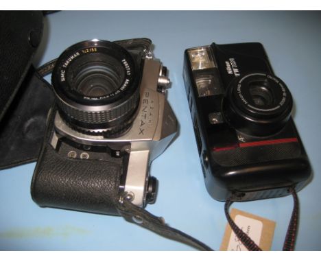 Pentax 35mm camera and a Nikon pocket camera