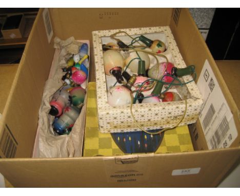 Two boxes containing a collection of various vintage Christmas decorations including lights etc
