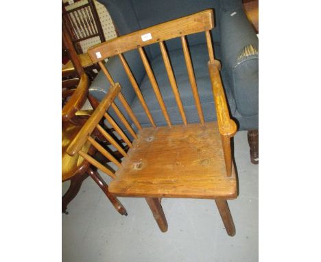 19th Century elm primitive Windsor chair, the stick back above a plank seat and splay supports
