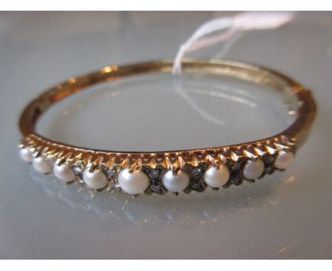 9ct Gold split pearl and diamond set bangle