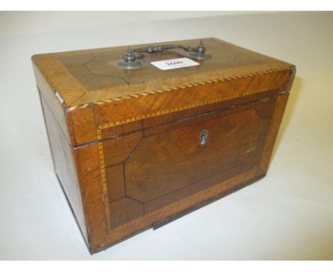 Good George III mahogany crossbanded line and chequer inlaid tea caddy, the hinged lid with original ornate white metal handl