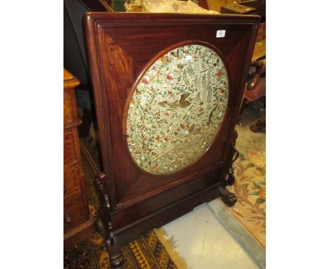 Mid 20th Century Chinese hardwood firescreen inset with an oval panel of Chinese silk and gold thread embroidery