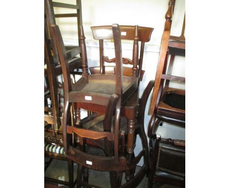 Set of six George IV mahogany dining chairs, the bar backs with carved centre rails above curved panel seats and turned taper