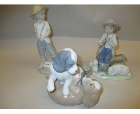 Group of three Nao figures, ' A Soothing Tune ', ' Boy with Catapult ' and  'Twerpe and Mikie '