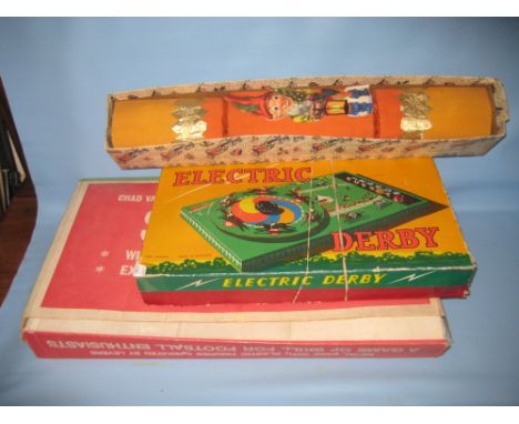 Boxed Chad Valley tin plate football game, electric Derby game and a large mid 20th Century Christmas cracker