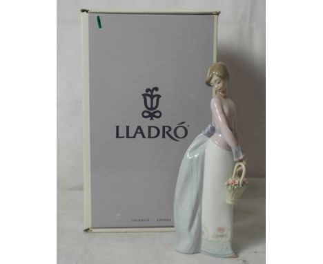 A boxed Lladro figure "Basket of Love" 07622