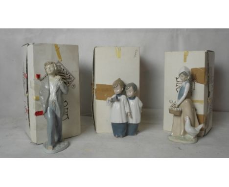 Three boxed Nao figures to inc "Choirboy"