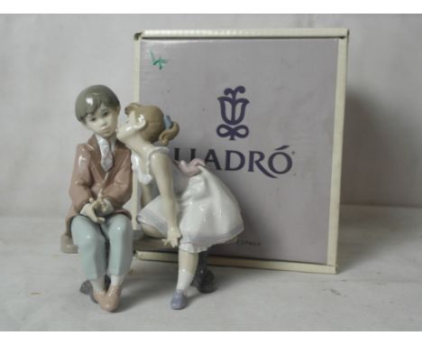 A boxed Lladro figure "Ten & Growing" 07635