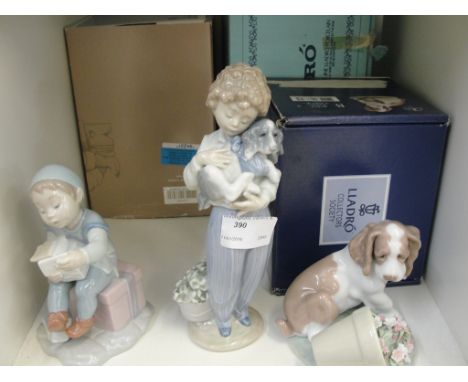 Three boxed Lladro figures: "Santa's Workshop" "Boy With Dog" 7609 & "It Wasn't Me" 07672
