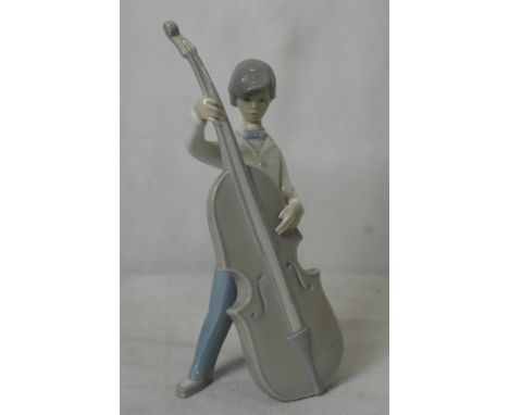 A Lladro boy with double bass