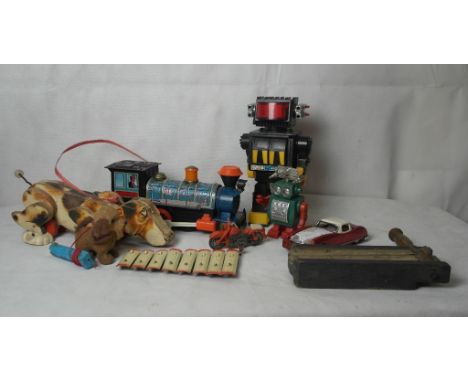 A quantity of tinplate and vintage toys to inc 1960s robots